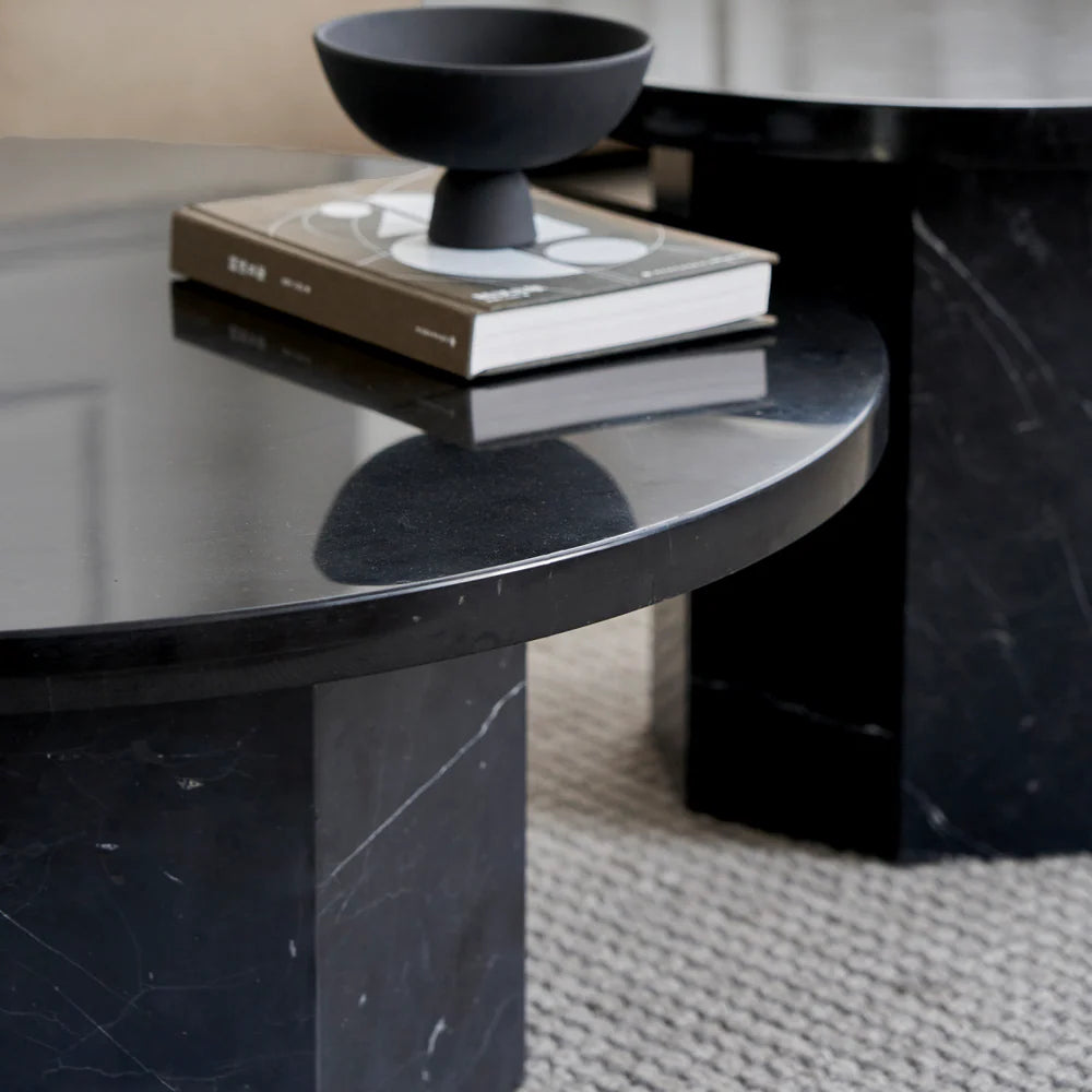 Table basse ronde en marbre noir