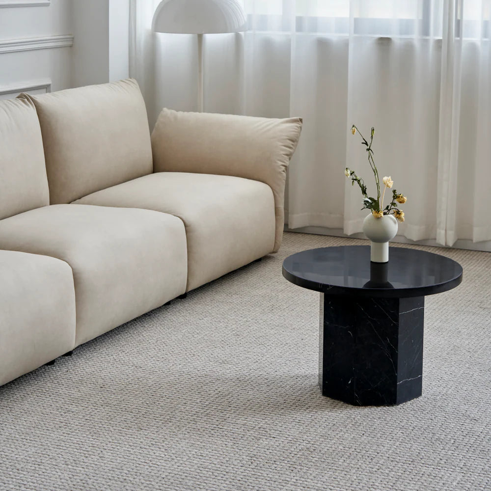 Table basse ronde en marbre noir
