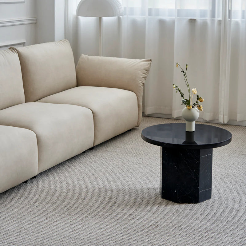 Table basse ronde en marbre noir