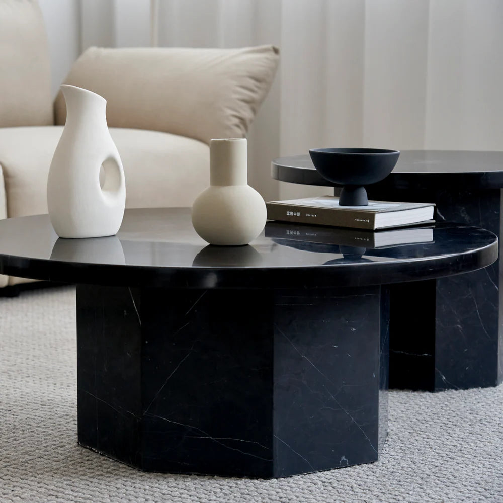 Table basse ronde en marbre noir