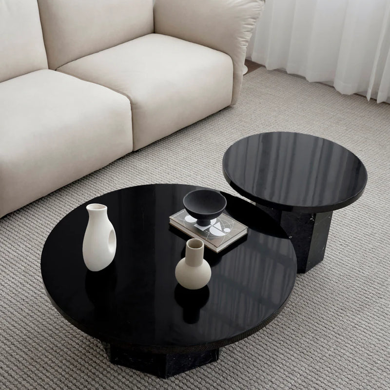 Table basse ronde en marbre noir