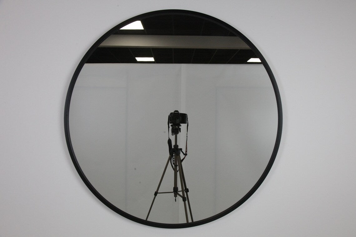 Miroir rond cadre en  métal