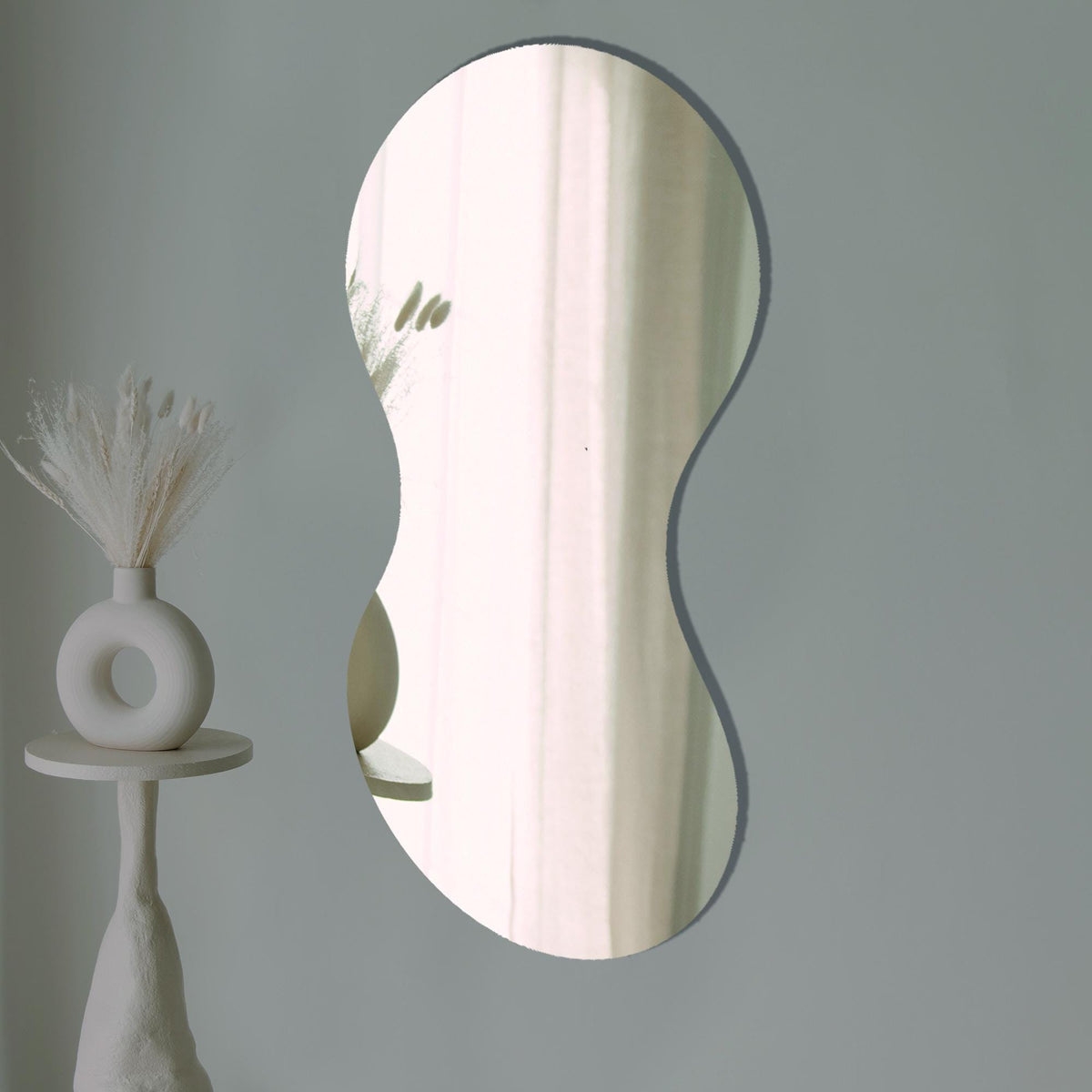 Miroir mural LED moderne de forme organique